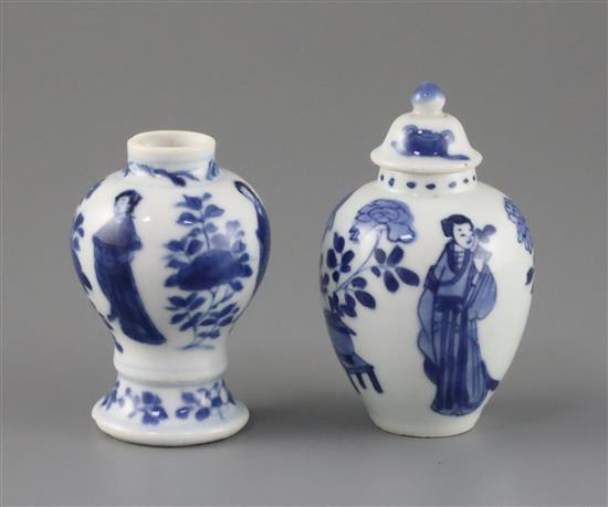 A Chinese blue and white small jar and cover, and a similar small vase, Kangxi period, H. 6.7 and 7.7cm